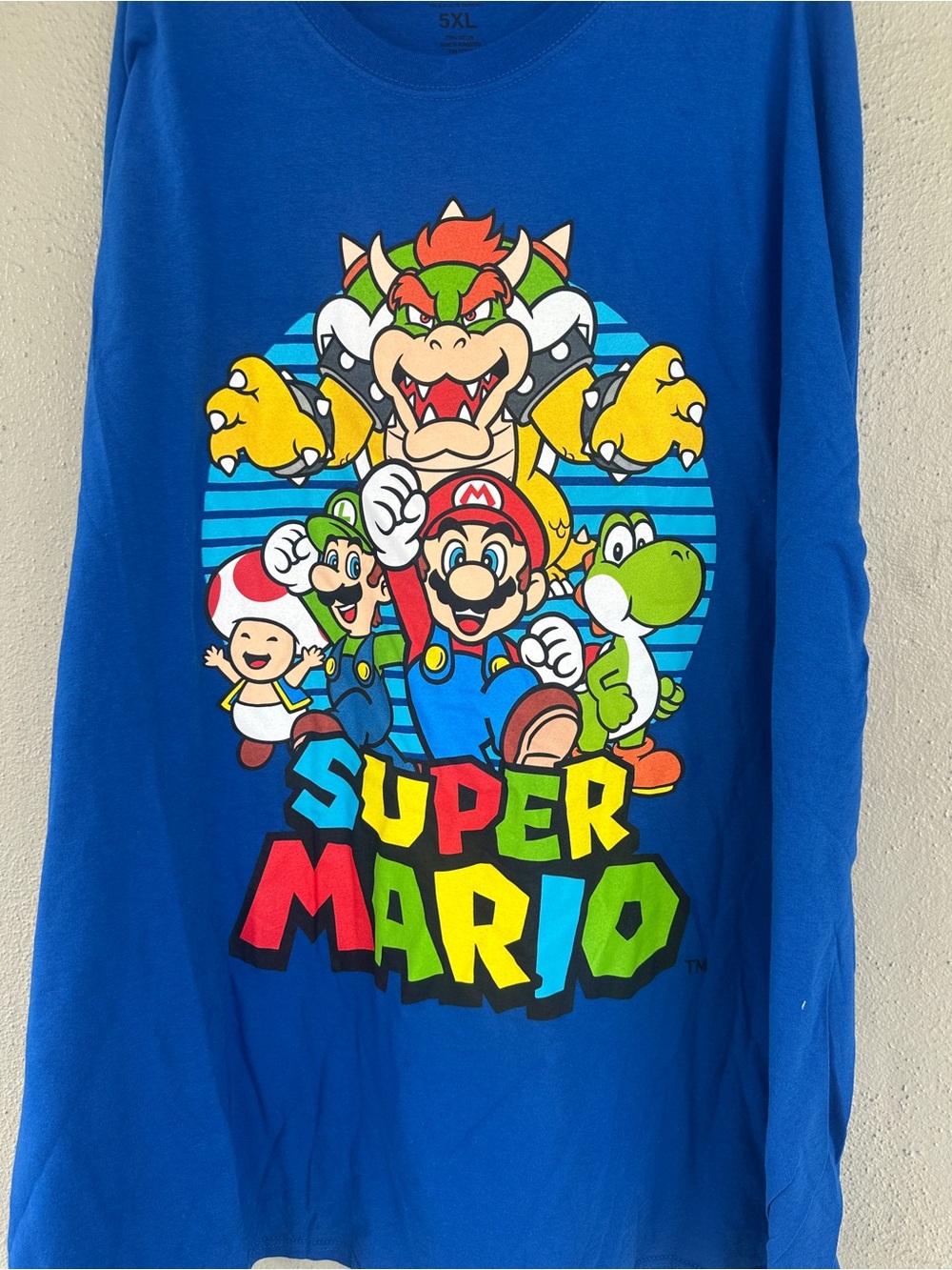 Nintendo Blue Super Mario Group Graphic Tee with Multicolor Print